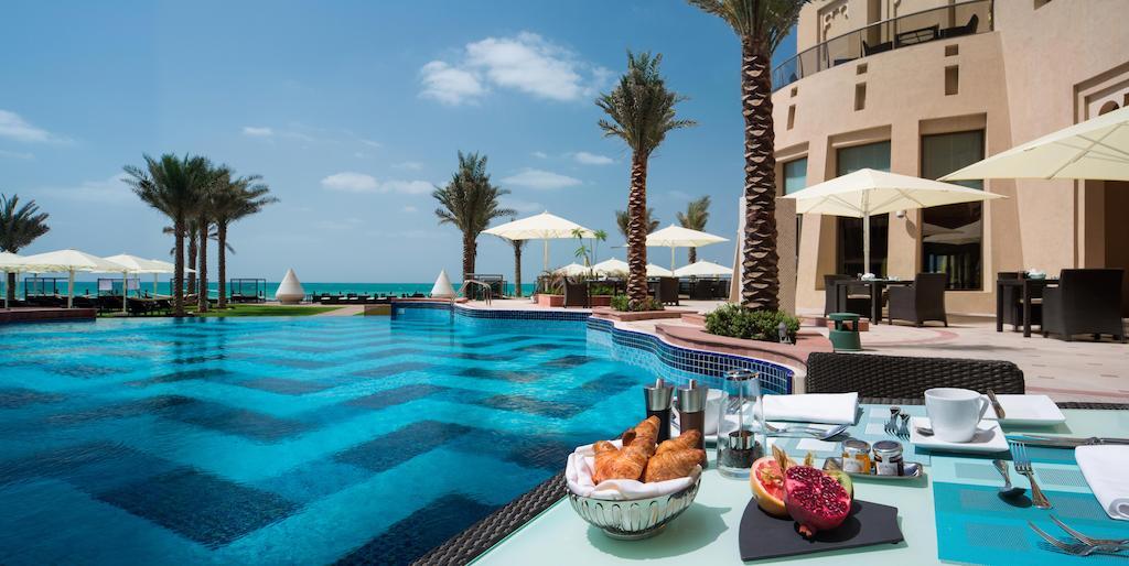 Bahi Ajman Palace Hotel Buitenkant foto The pool at the Ritz-Carlton, Ras Al Khaimah