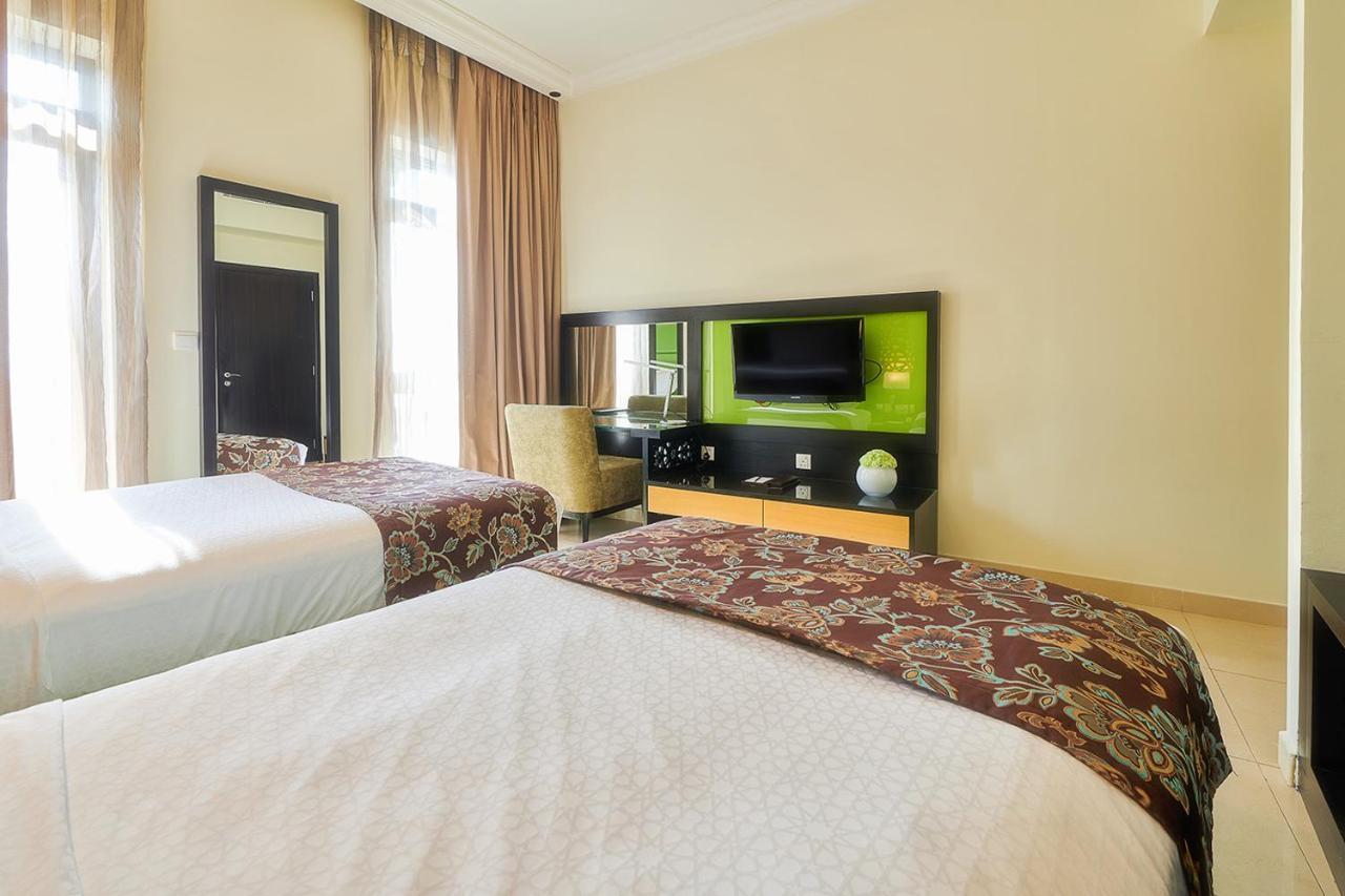 Bahi Ajman Palace Hotel Buitenkant foto A room at the hotel