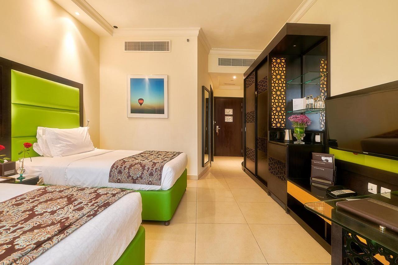 Bahi Ajman Palace Hotel Buitenkant foto Deluxe room