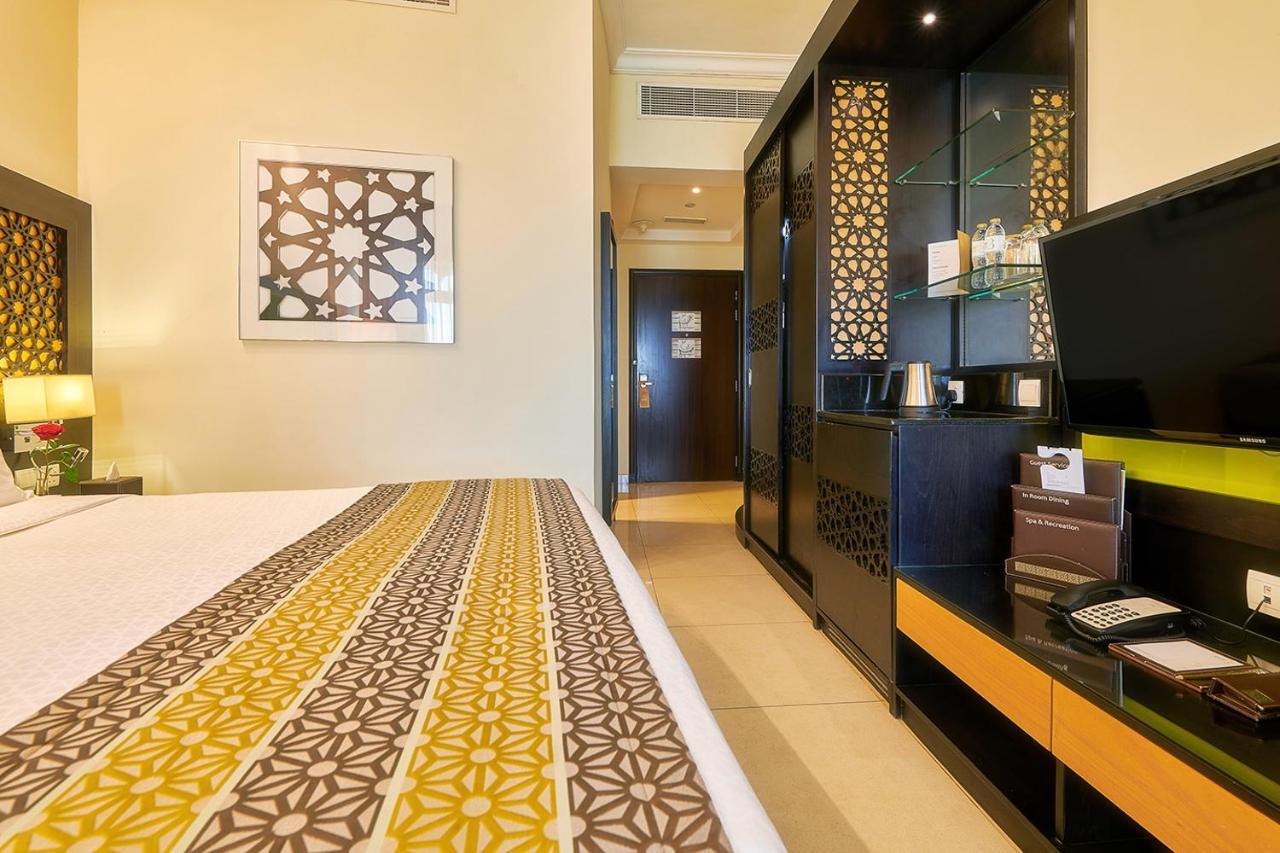 Bahi Ajman Palace Hotel Buitenkant foto A room at the hotel